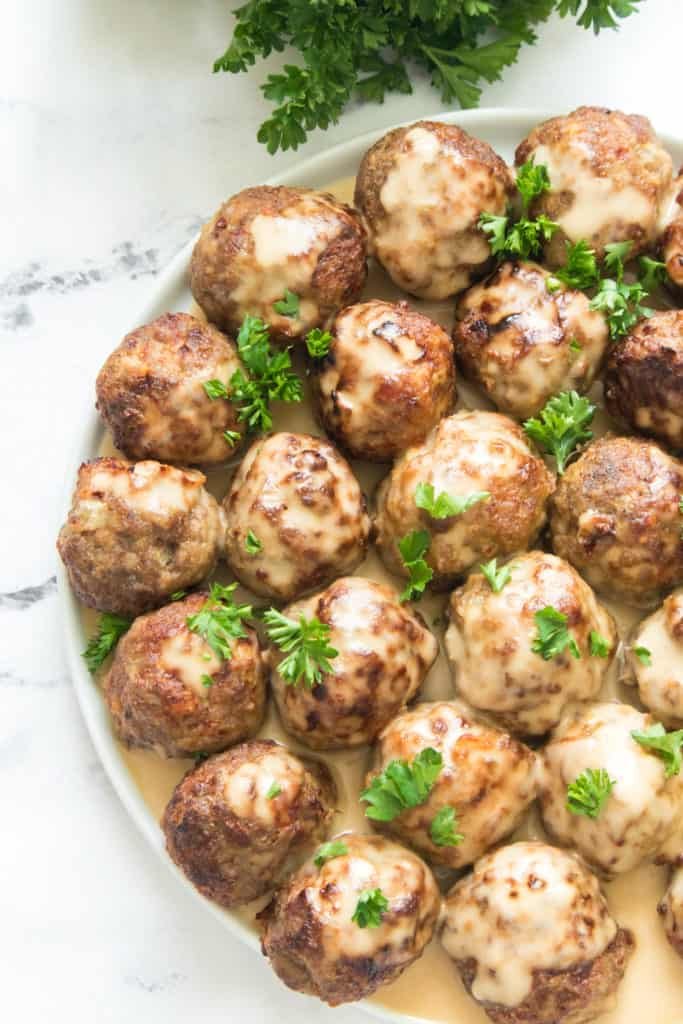 Frozen Swedish meatballs quickly pan‑fried, topped with creamy sauce and fresh herbs