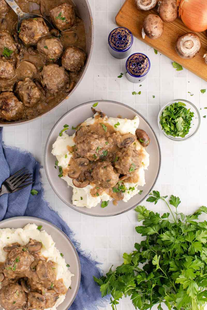 Swedish meatballs smothered in rich brown cream gravy packed with tender sautéed cremini mushrooms