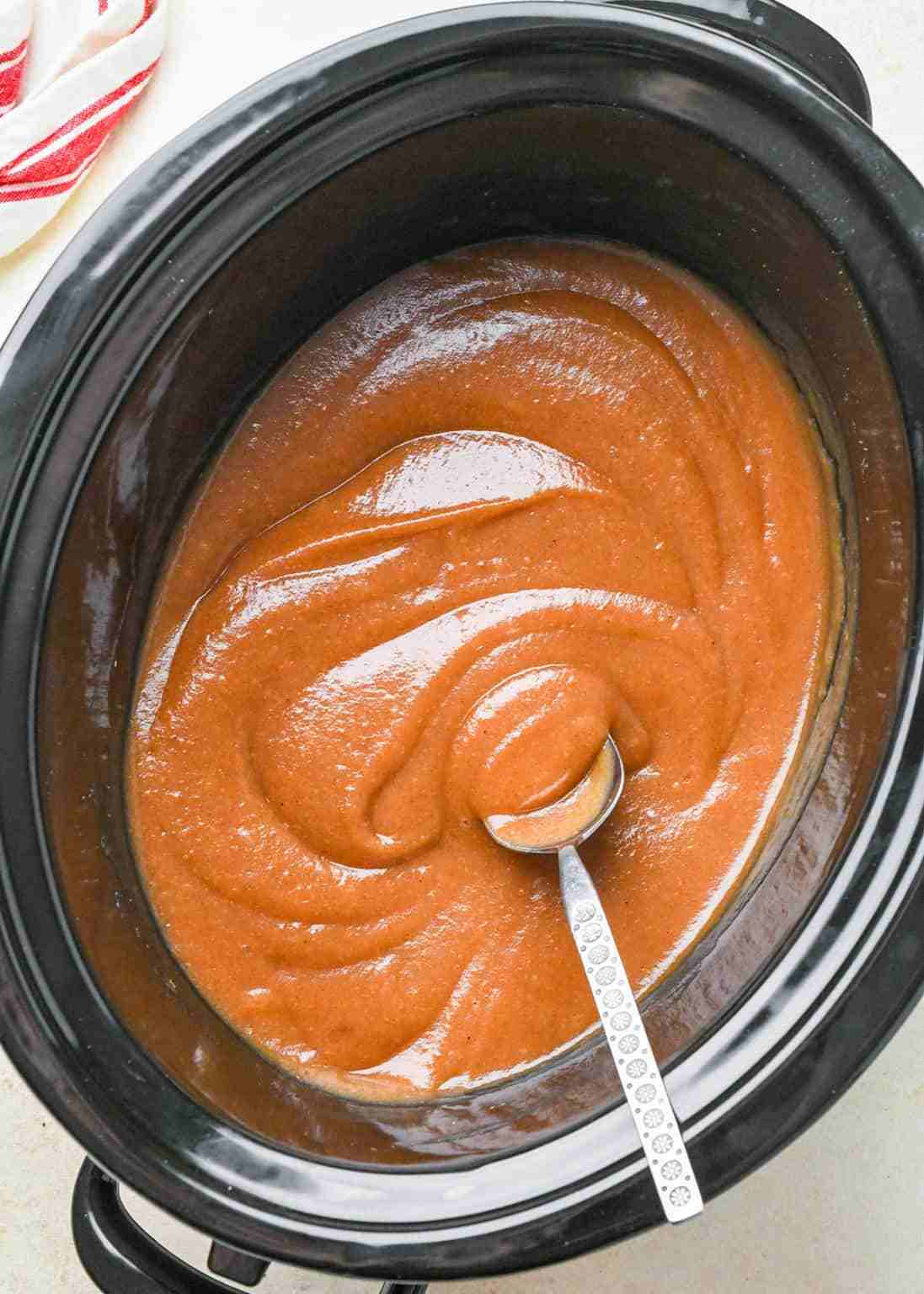 Classic apple butter with honey, caramel apple aroma, warm cinnamon, cloves, mason jar