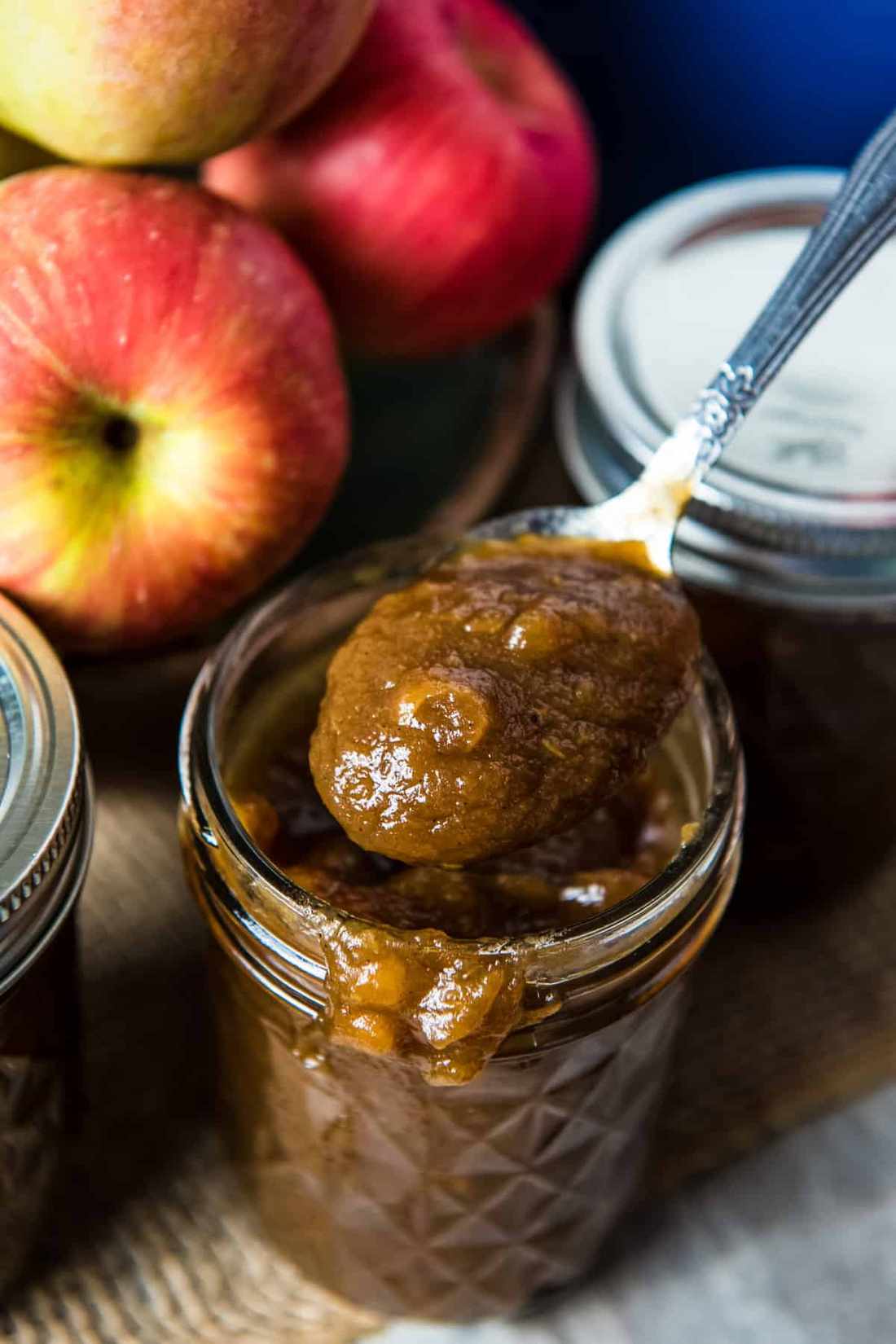 Smooth apple butter in a mason jar, golden hue, fragrant spices, perfect for autumn spreads