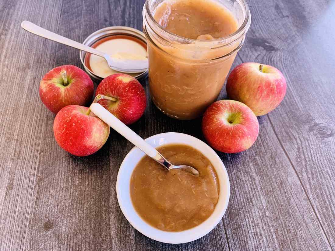 Quick apple butter from Instant Pot, served warm in a mason jar