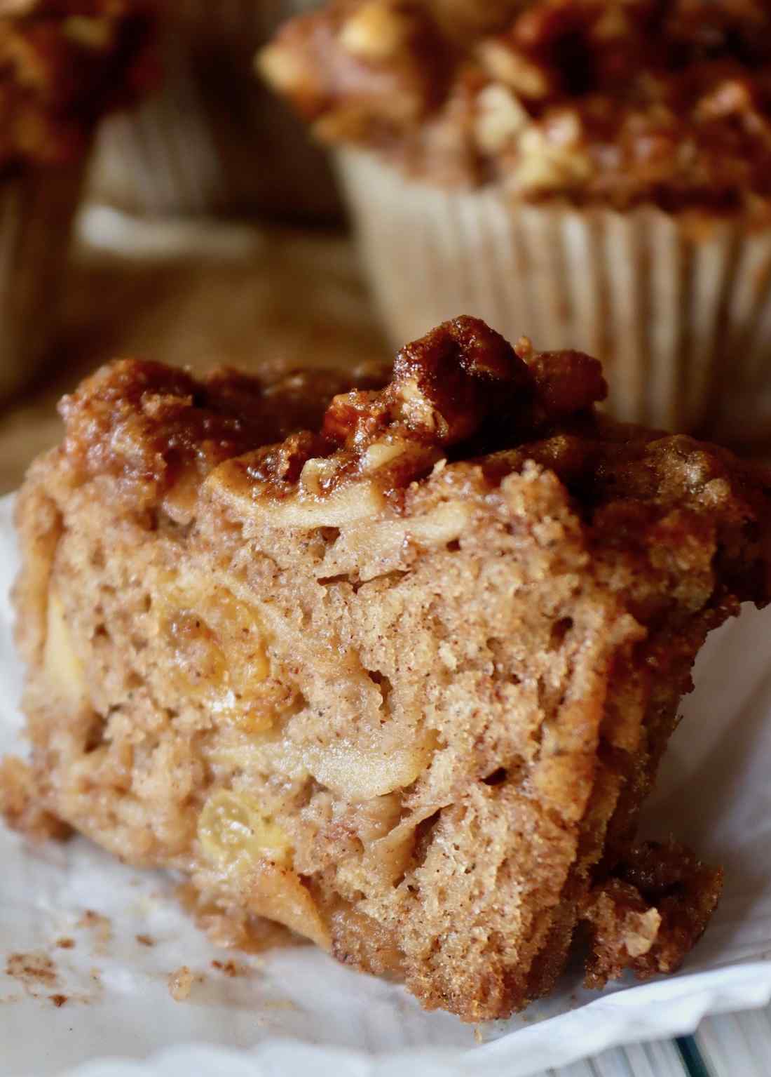 Golden apple butter streusel muffins with crunchy topping, served warm