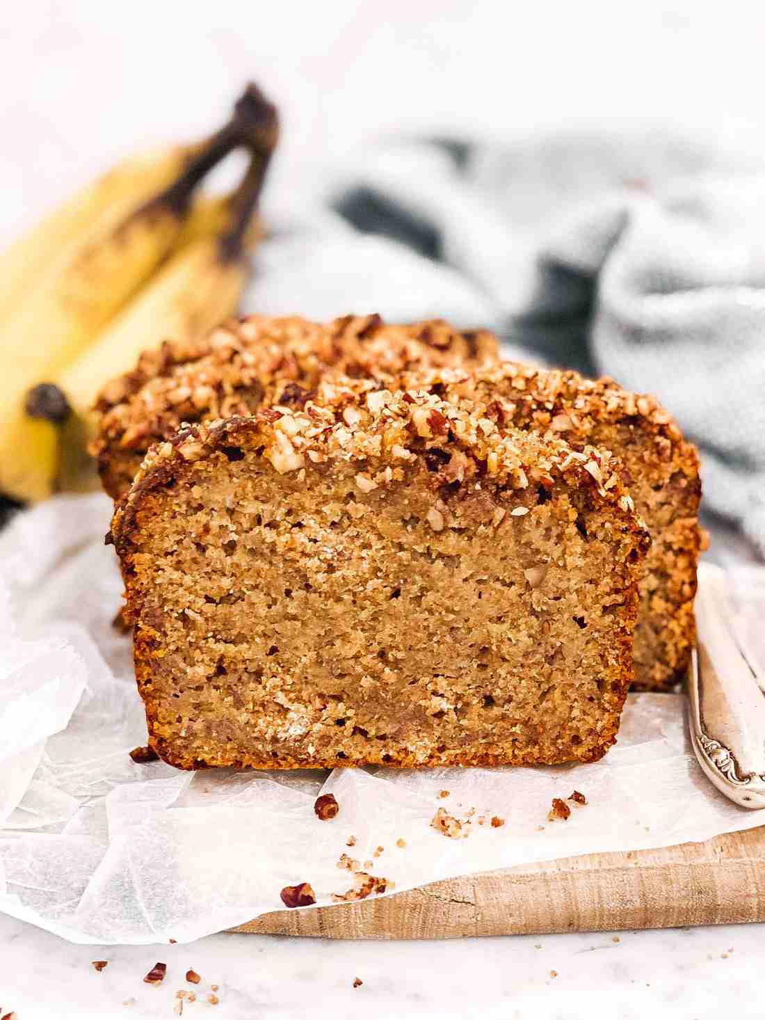 Golden‑crusted banana bread loaf with a silky, banana‑filled interior