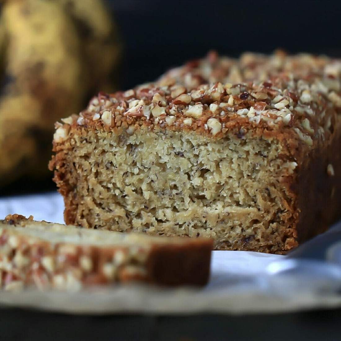 Classic moist banana bread with golden crust, tender crumb, and rich banana flavor