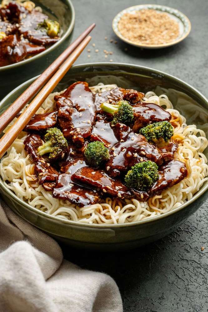 Glossy beef and broccoli over ramen noodles with tender beef, crisp broccoli, and glossy noodles