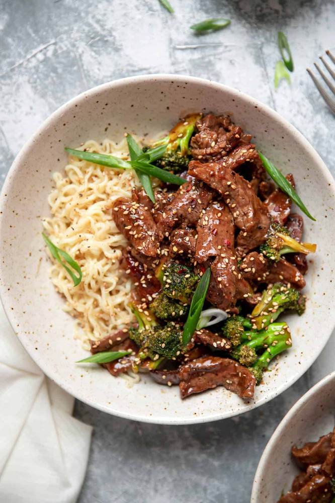 Classic homemade beef and broccoli noodles with tender beef, crisp broccoli, glossy noodles