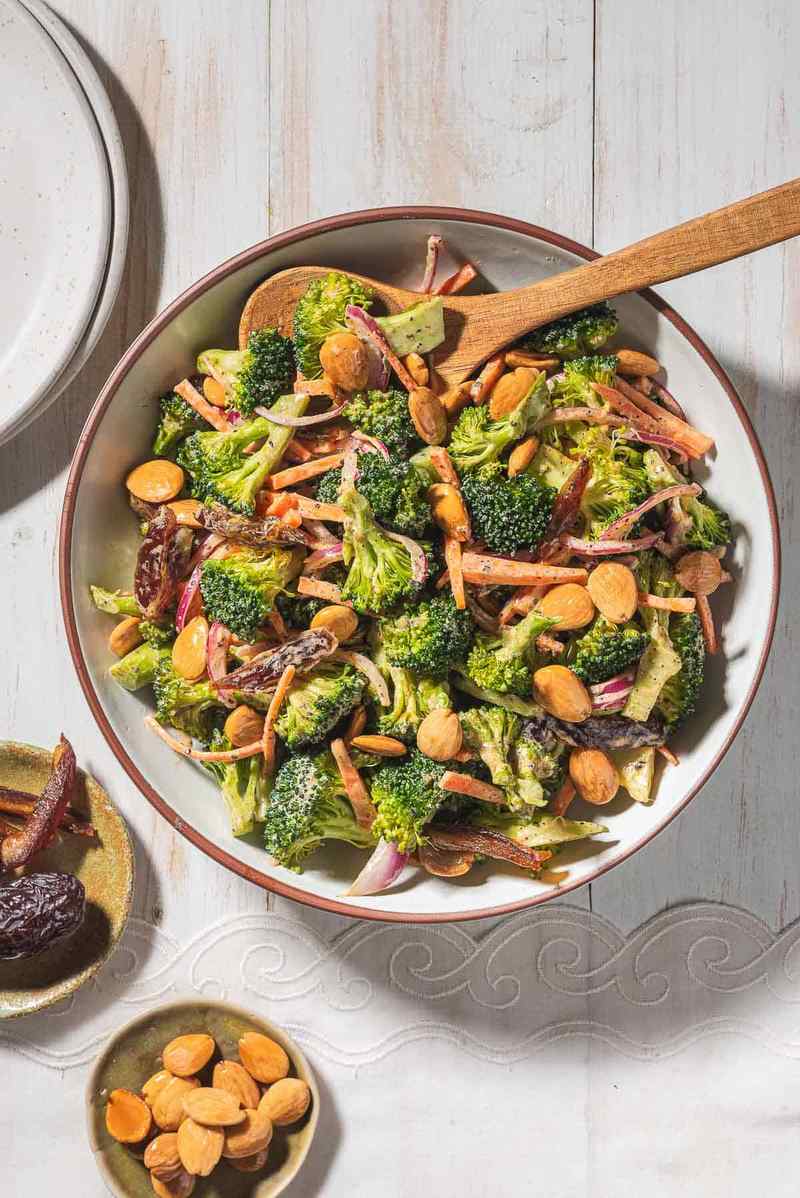 Mediterranean broccoli salad with crisp florets, capers, lemon vinaigrette, feta, and roasted red peppers