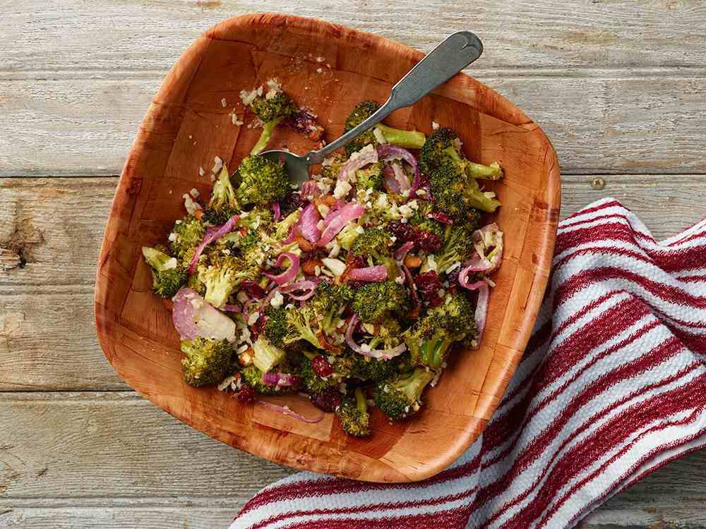 Grilled broccoli salad with lemon‑garlic vinaigrette, toasted almond slivers, and crumbled feta