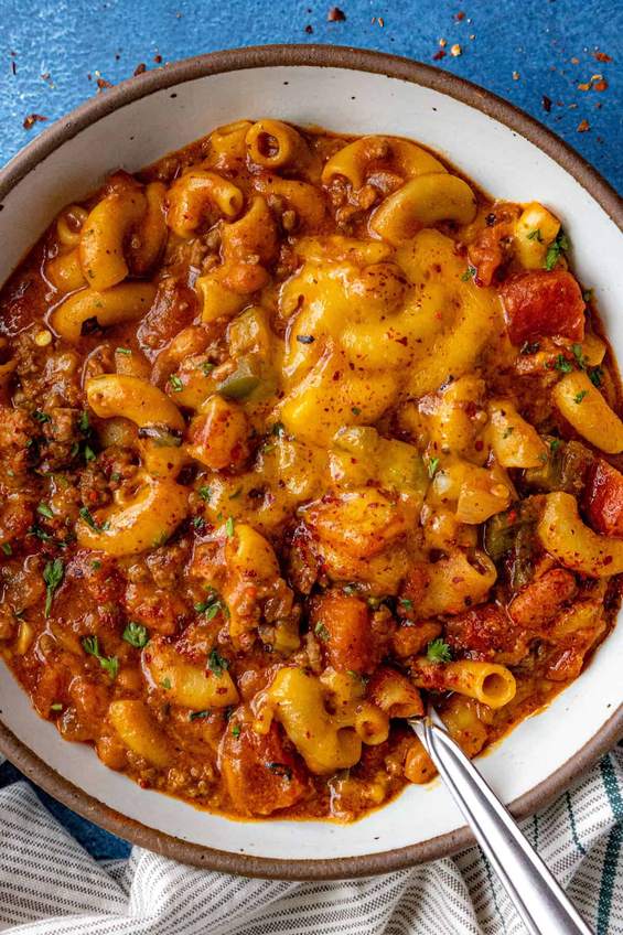 Pepper jack skillet chili mac bubbling with melted pepper jack cheese and jalapeños