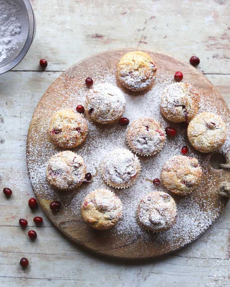 Moist orange‑zested muffins studded with bright cranberries and a light glaze