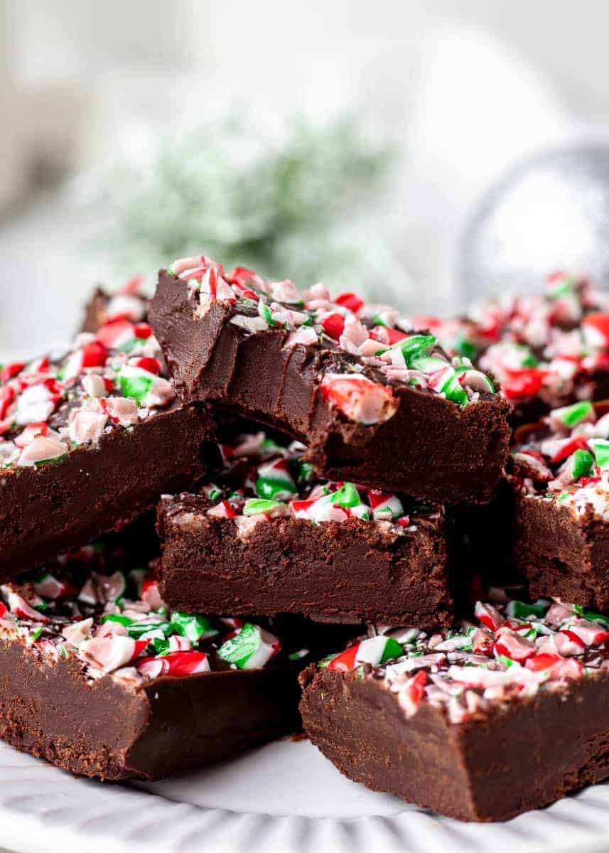 Rich chocolate fudge swirled with peppermint, cut into candy‑cane shapes, dusted with red sugar
