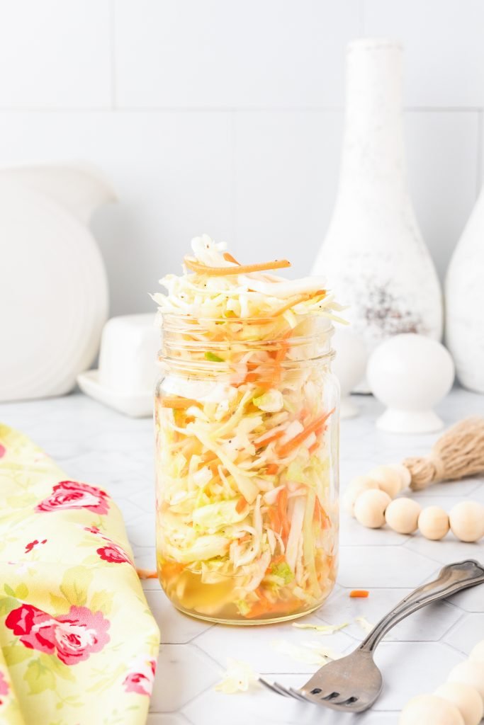 Spicy sesame vinaigrette drizzled over crunchy cabbage, peppery heat, and nutty aroma