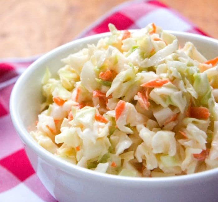 Ultra‑creamy KFC style coleslaw, crisp cabbage, smooth dressing, sweet carrot accents