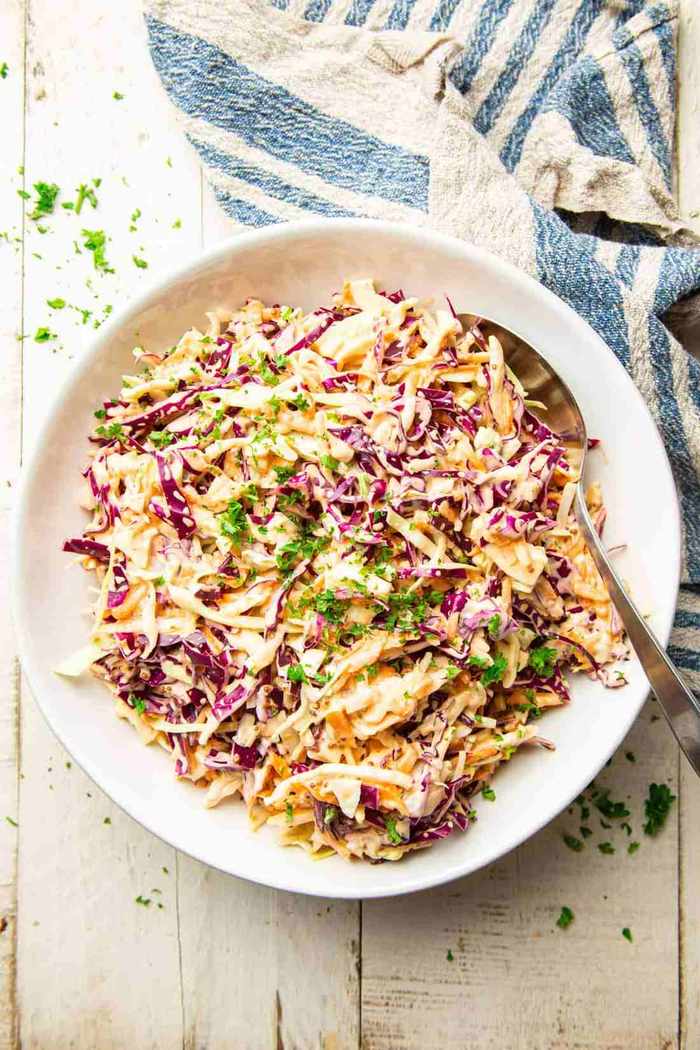 Classic creamy coleslaw with fresh cabbage, velvety dressing, and satisfying cool crunch