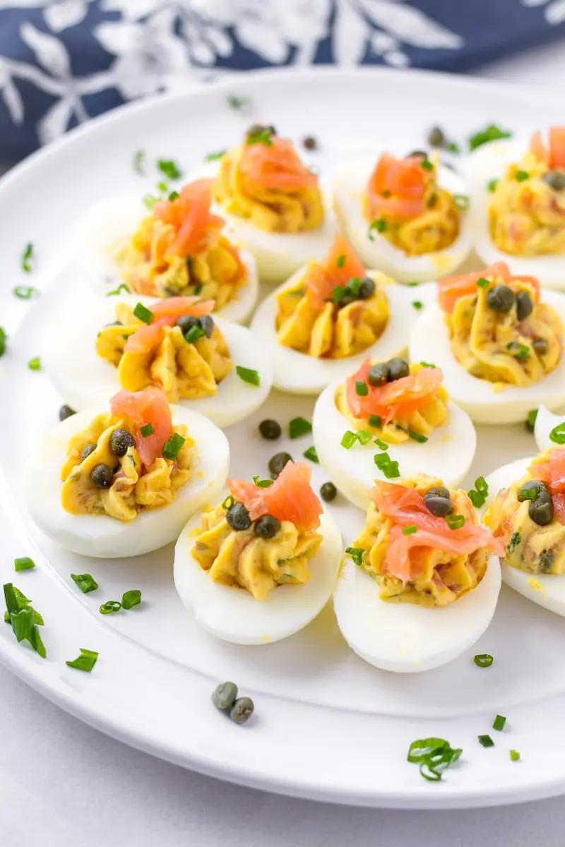 Seafood deviled eggs topped with chopped shrimp, dill, and a hint of lemon