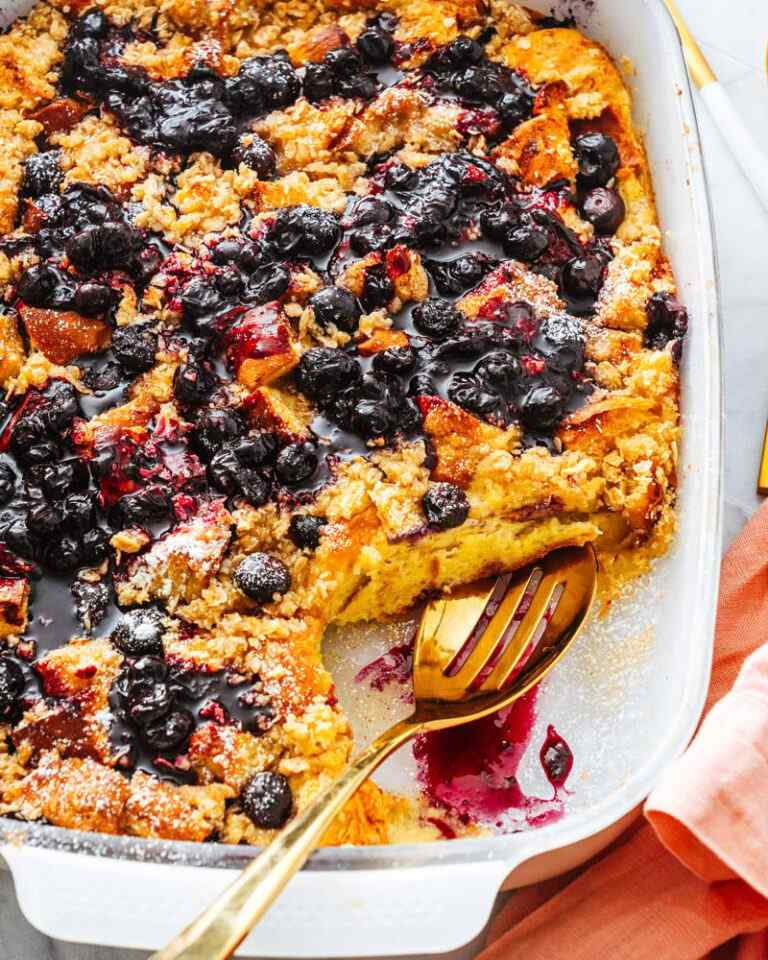 Golden custardy bread cubes swirled with plump blueberries, drizzled with maple syrup