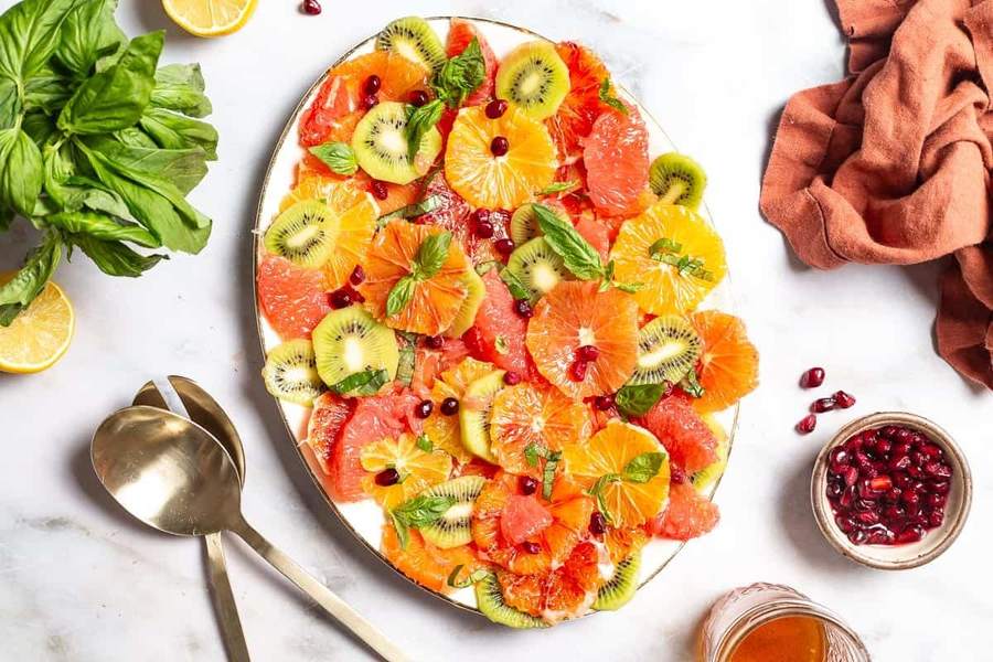 Berry citrus fruit salad with grapes, berries, citrus, and honey glaze