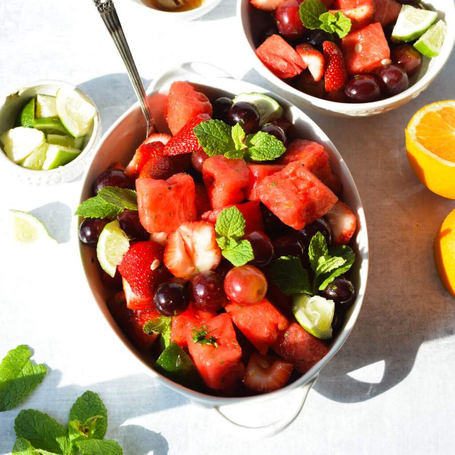 Watermelon feta mint fruit salad with crisp cubes, salty feta, fresh mint, and citrus drizzle