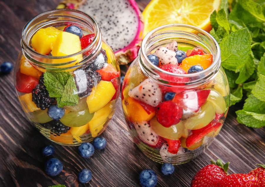 Classic fresh fruit salad with kiwi, mango, pineapple, and a lime‑honey drizzle