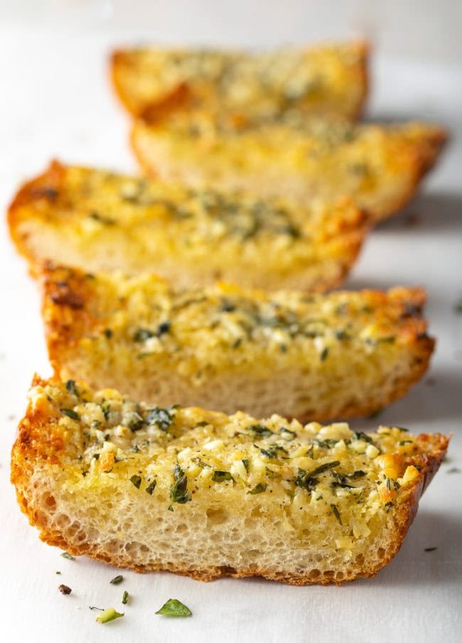 Golden buttery crust with melted garlic butter, crispy edges, and aromatic garlic aroma