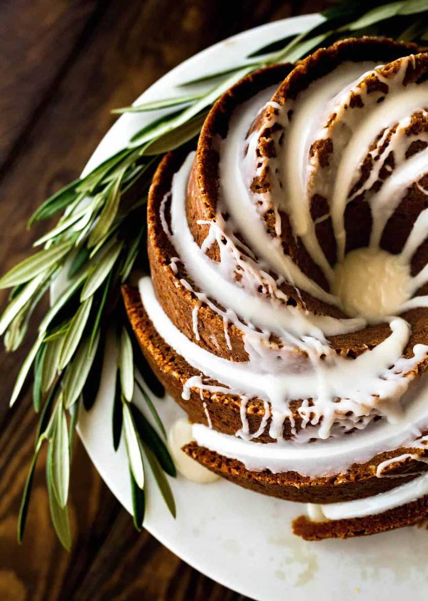 Glossy classic gingerbread bundt cake with a syrup glaze.