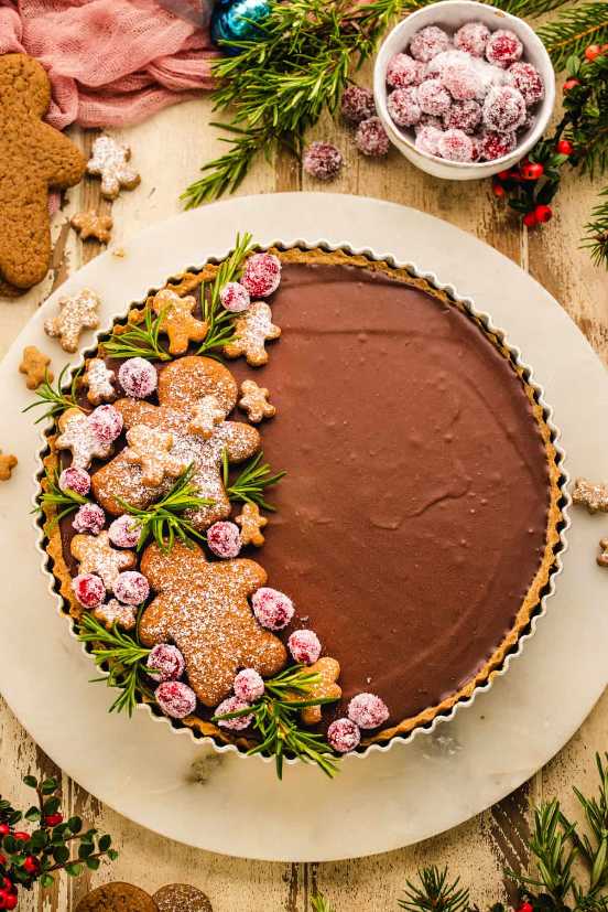 Round tart with a gingerbread crust and chocolate ganache filling.