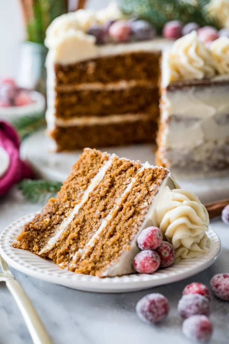 Three-layer gingerbread cake with white buttercream frosting.