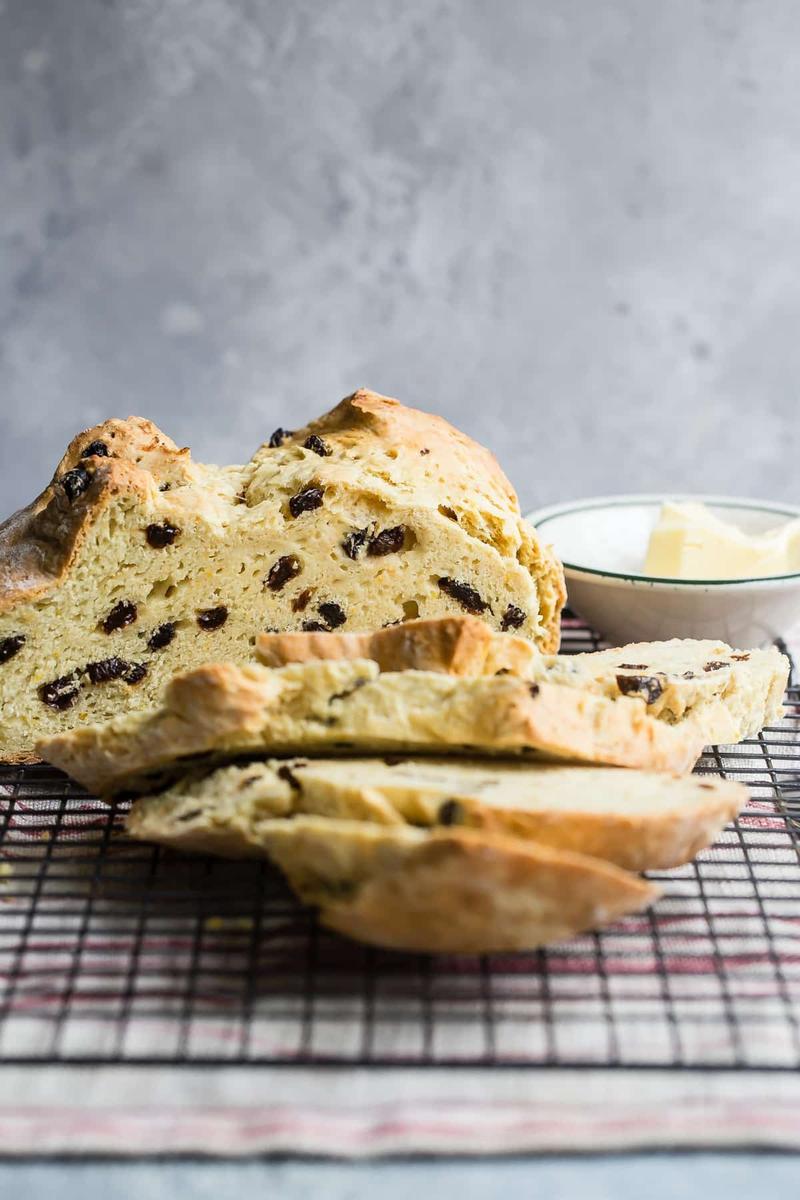 Rustic traditional Irish soda bread loaf with a deep cross and crunchy crust