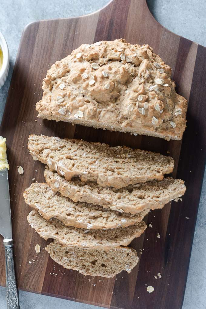 Dark brown Irish brown bread loaf with a dense crumb and rustic crust