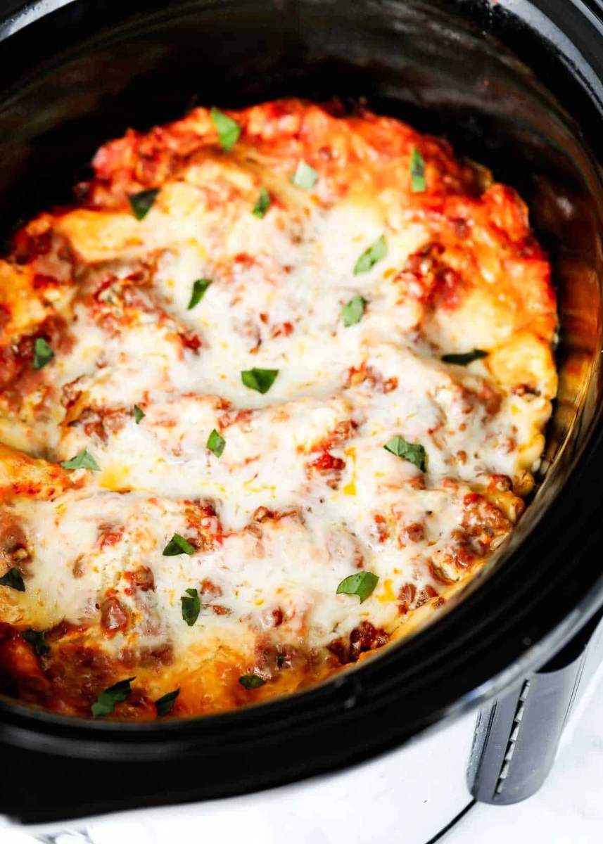 Golden bubbling cheese crowns layered pasta, rich meat sauce in a classic homemade lasagna.