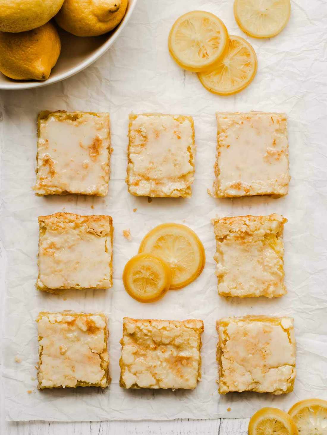 Buttery shortbread base, glossy lemon curd, dusted with fine powdered sugar