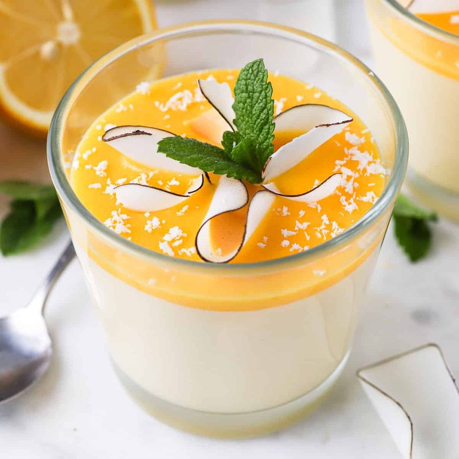 Silky lemon mousse topped with a ribbon of bright lemon curd and mint leaves