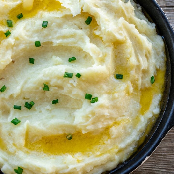 Creamy buttermilk mashed potatoes blended with sharp white cheddar cheese and fresh green chives