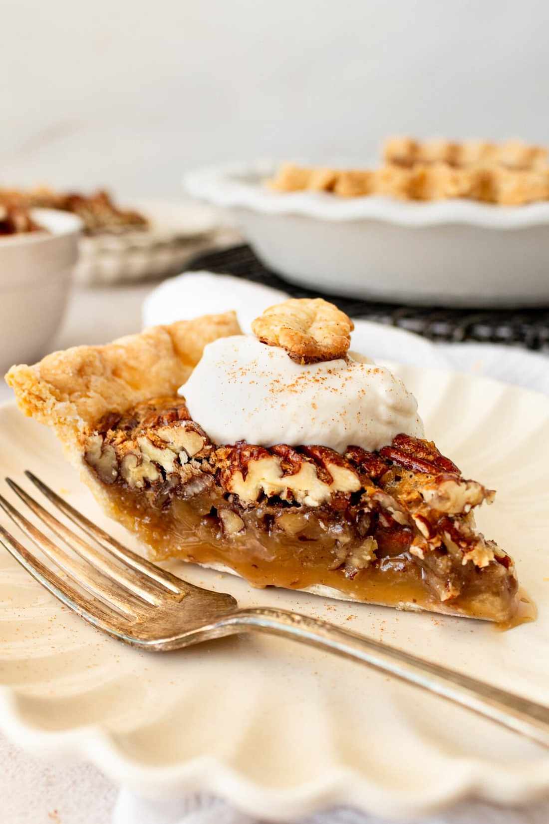 Golden classic pecan pie with subtle orange zest and clover honey glaze