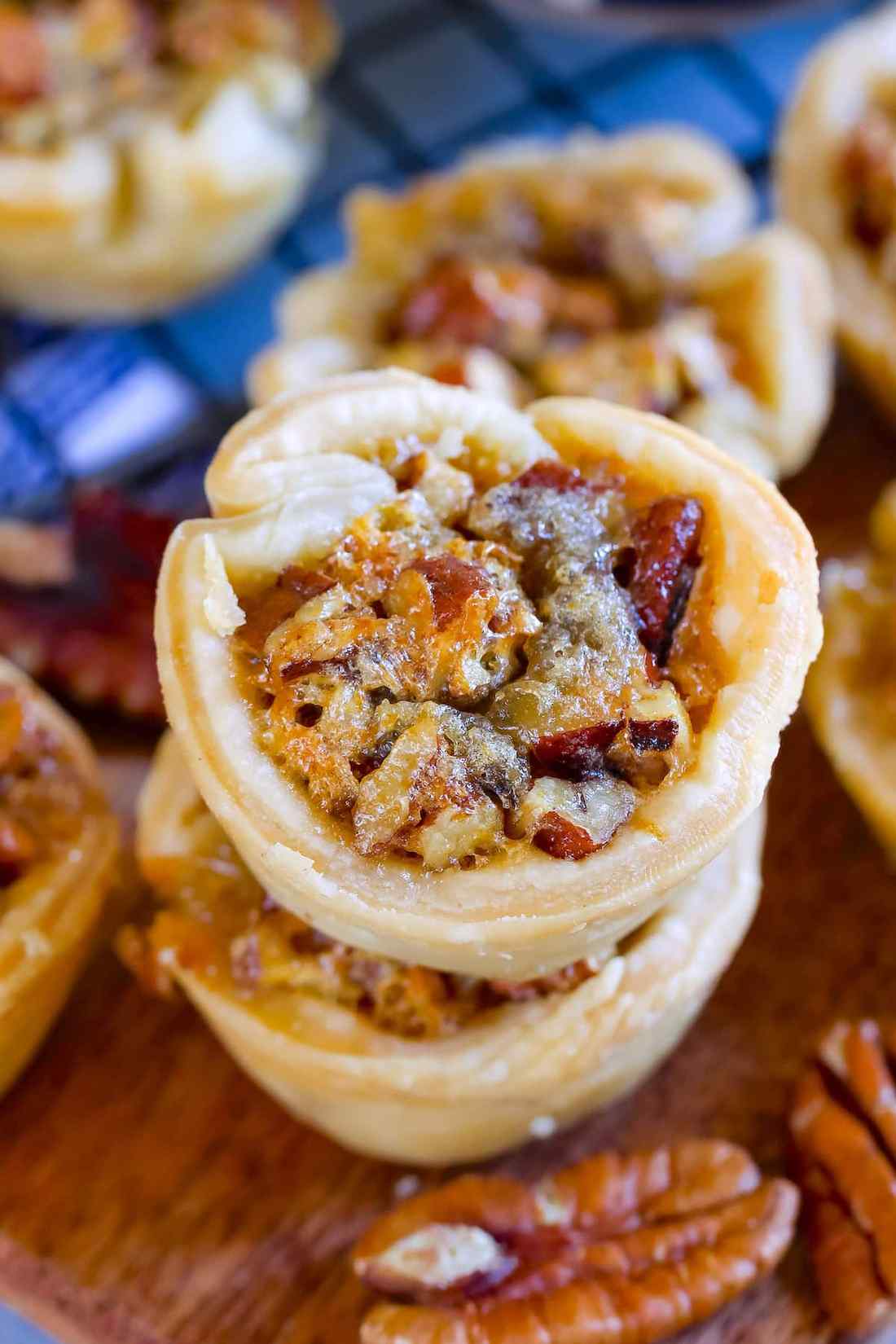 Crispy phyllo dough mini pecan pies with golden nut filling
