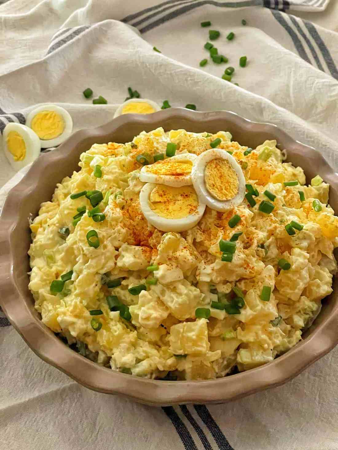 Classic creamy potato salad with tender potatoes, velvety dressing, fresh dill, and crunchy celery