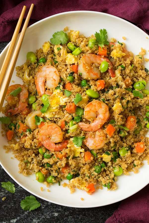 Shrimp quinoa fried rice with fluffy grains, tender shrimp, and soy glaze