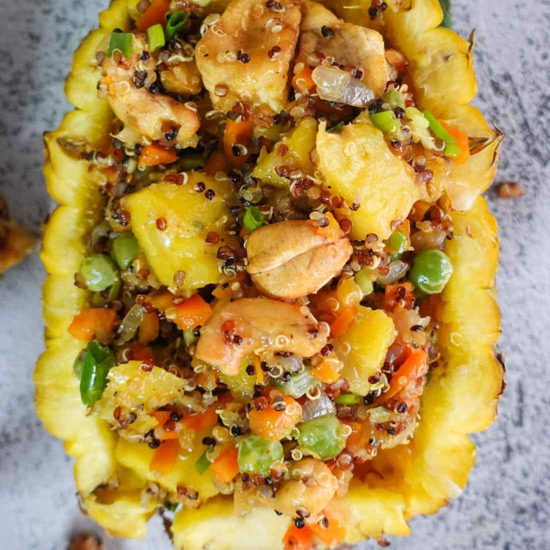 Sweet pineapple quinoa fried rice with fluffy grains, tropical pineapple, and soy glaze