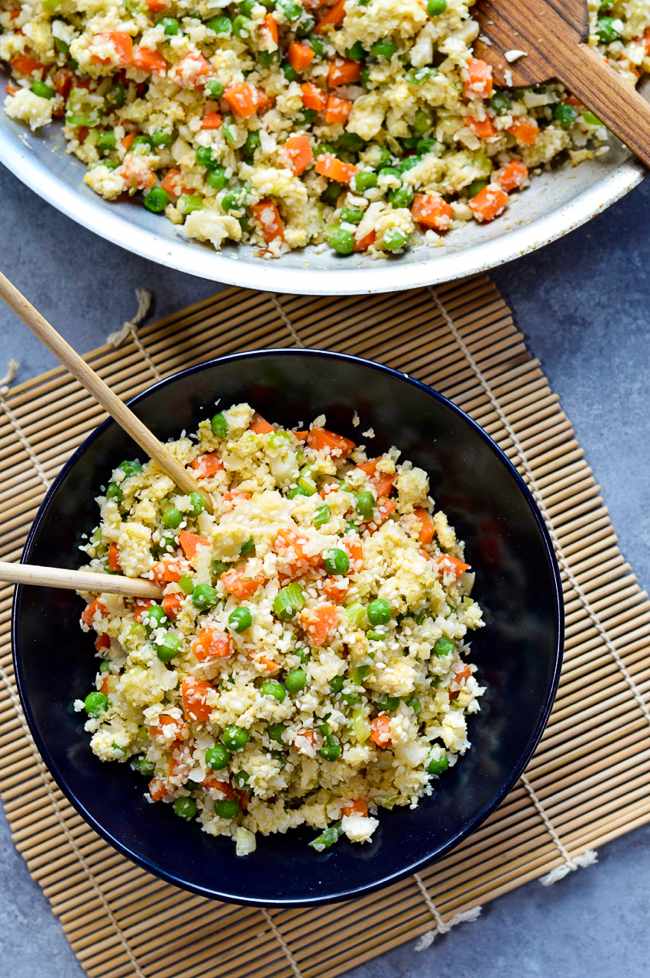 Creamy cauliflower quinoa fried rice with fluffy grains, cauliflower, and soy glaze