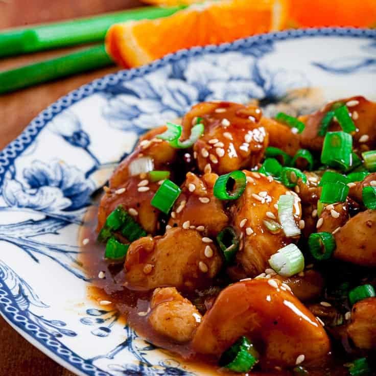 Chicken coated in orange glaze, finished with a drizzle of sesame oil and a sprinkle of toasted sesame seeds