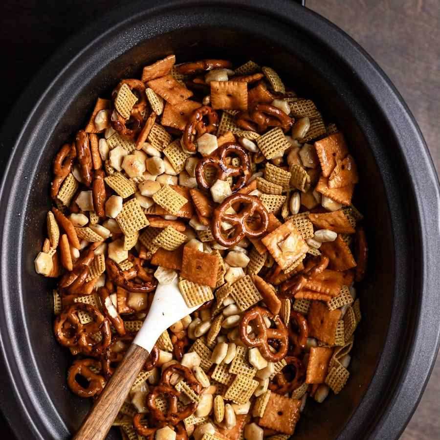 Ranch seasoned Chex mix with pretzels, almonds, butter, and herb seasoning