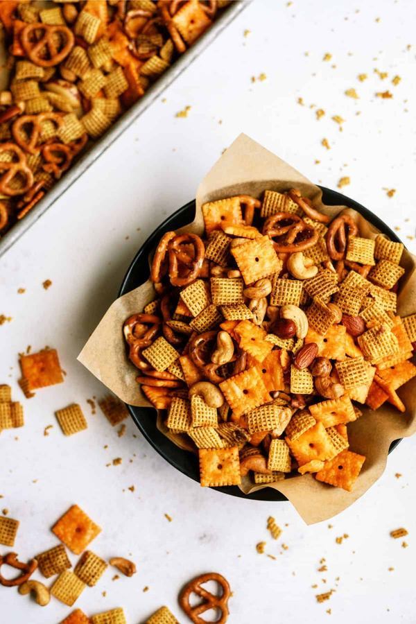 Savory herb Chex mix with rosemary, thyme, pretzel bites, and Parmesan