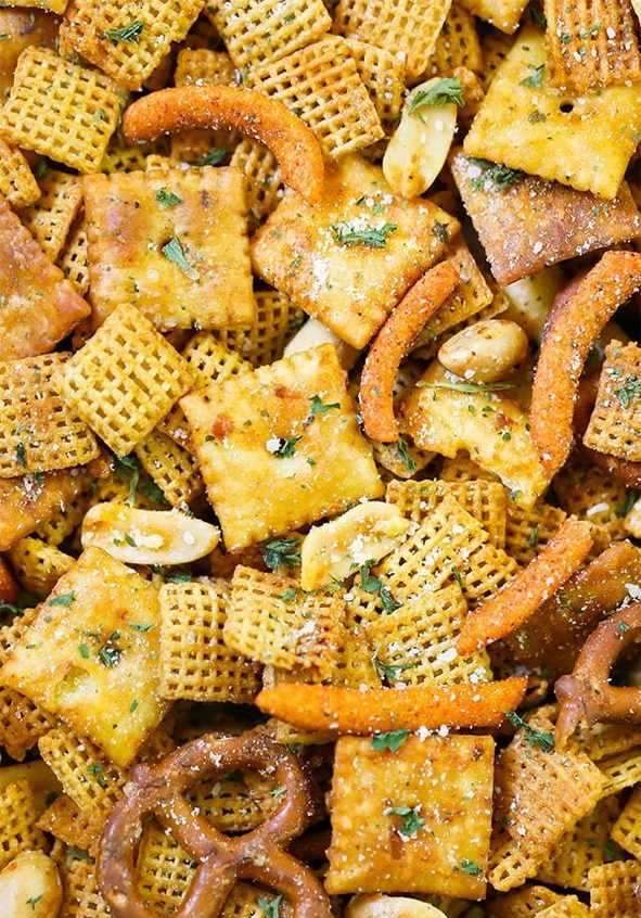 Buffalo ranch chex mix with crunchy Chex cereal, pretzels, nuts, spicy buffalo glaze, and creamy ranch coating