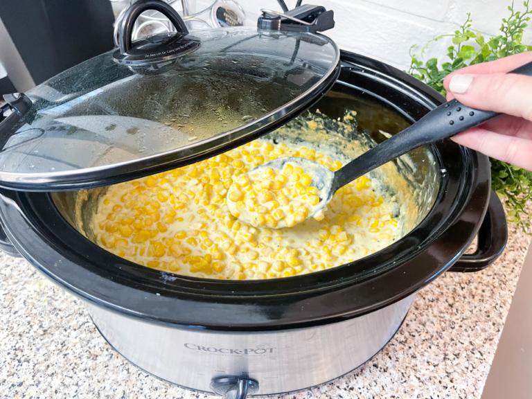 Thanksgiving creamed corn side with sage, parmesan, creamy butter sauce, festive crockpot side