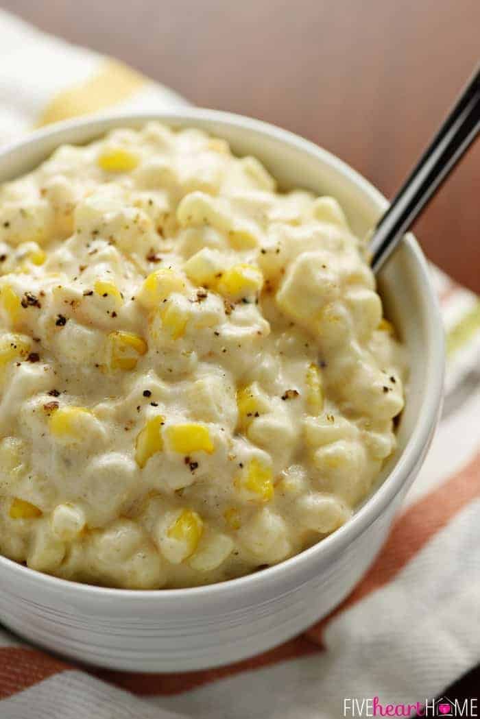 Cheesy cheddar creamed corn, slow cooker side with creamy sauce and golden cheese swirl