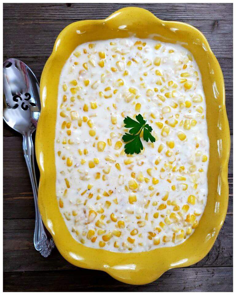 Thanksgiving creamed corn side dish, creamy sweet corn with buttery sauce, slow cooker comfort