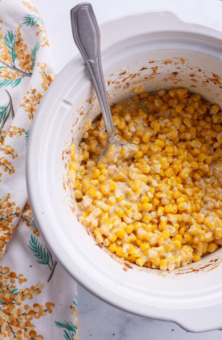 Classic slow cooker creamed corn with sweet kernels and creamy butter sauce, a timeless crockpot side.