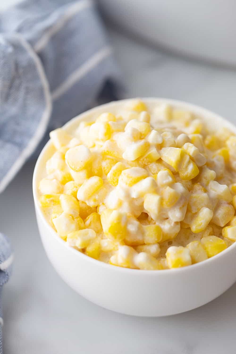 Classic slow cooker creamed corn with sweet kernels and creamy butter sauce, a comforting side dish.