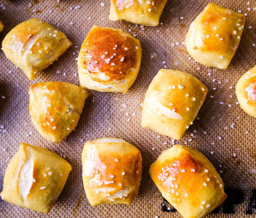 Golden pretzel bites lightly drizzled with honey and sprinkled with sea salt, sweet‑salty contrast