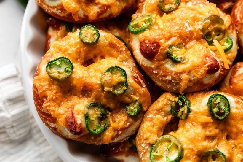 Spicy jalapeño cheddar soft pretzel bites with a creamy dip, perfect for snacking